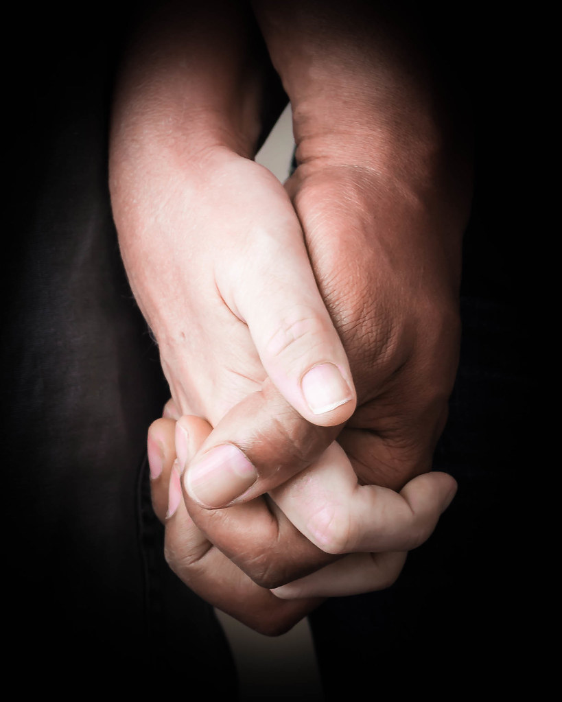 A couple holding hands