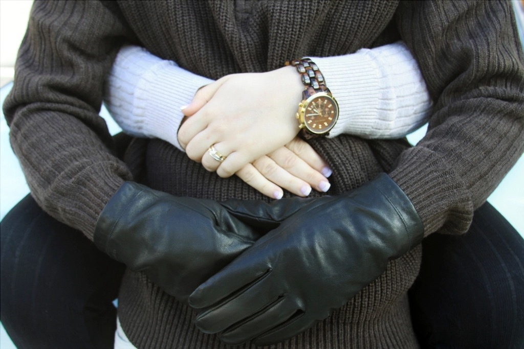 Two hands linked together